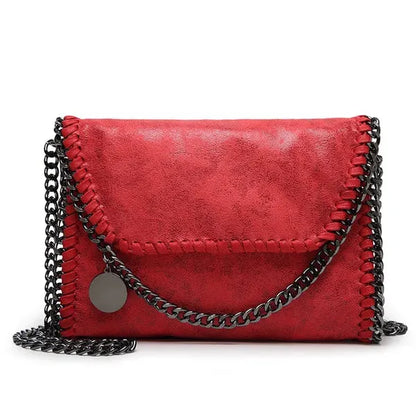 Suede clutch with chain