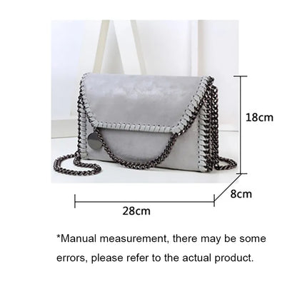 Suede clutch with chain