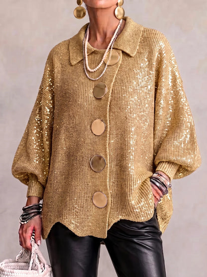 Loose-fitting solid color collared knit sweater with metal buttons and an irregular hem